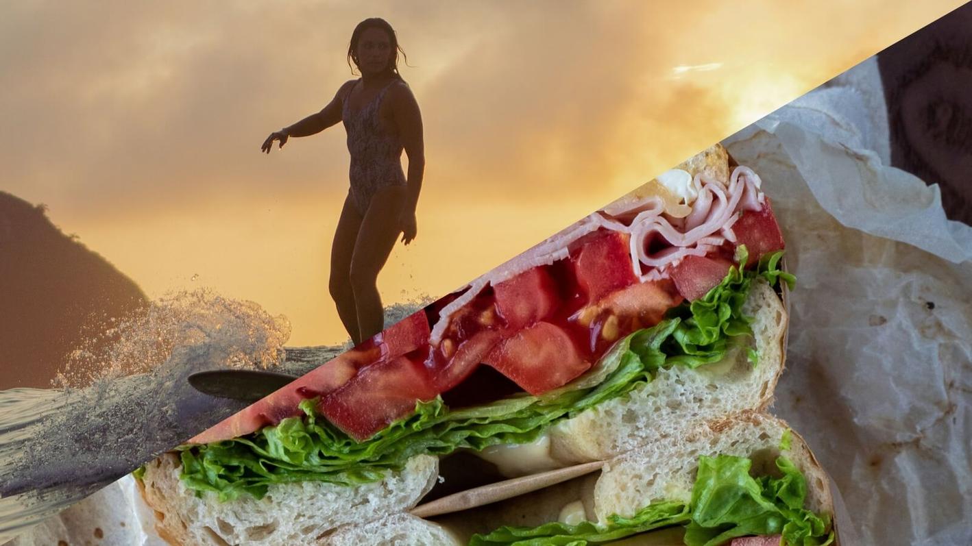 Image of a surfer on one side and a bagel on the other, depicting the west-east coast divide